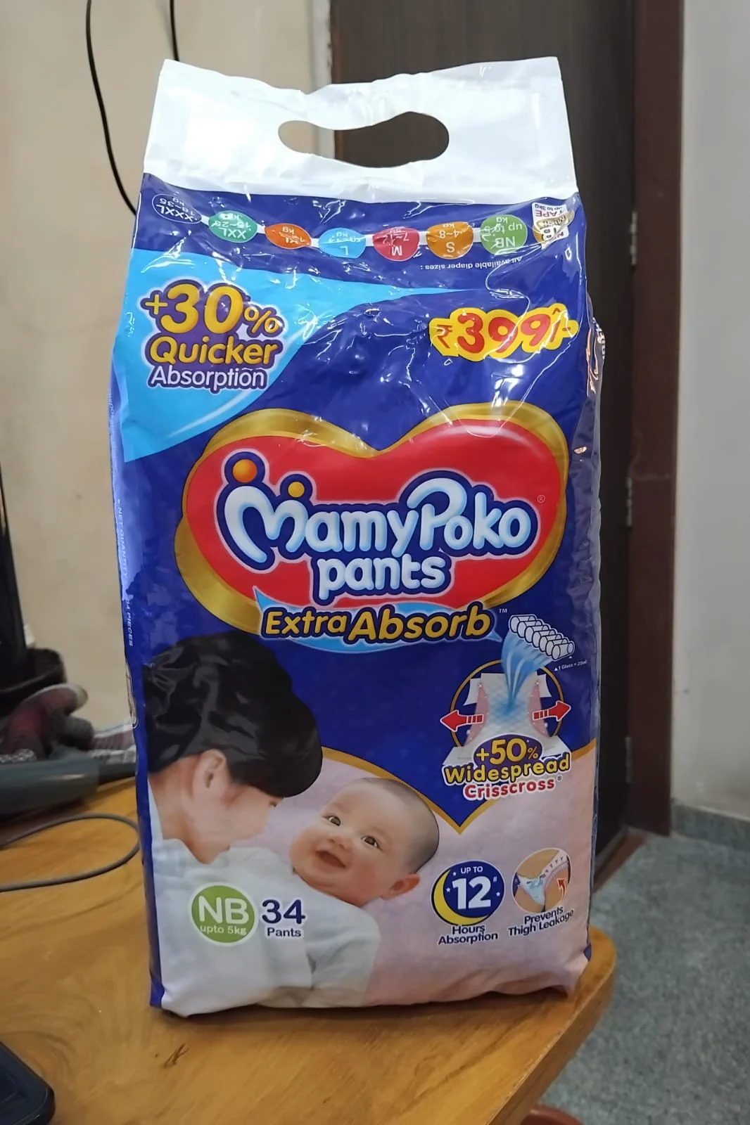 AM2294 MamyPoko Pants Extra Absorb Newborn Pant Style Diaper NB 5 Kg 34 Pants - Image 11