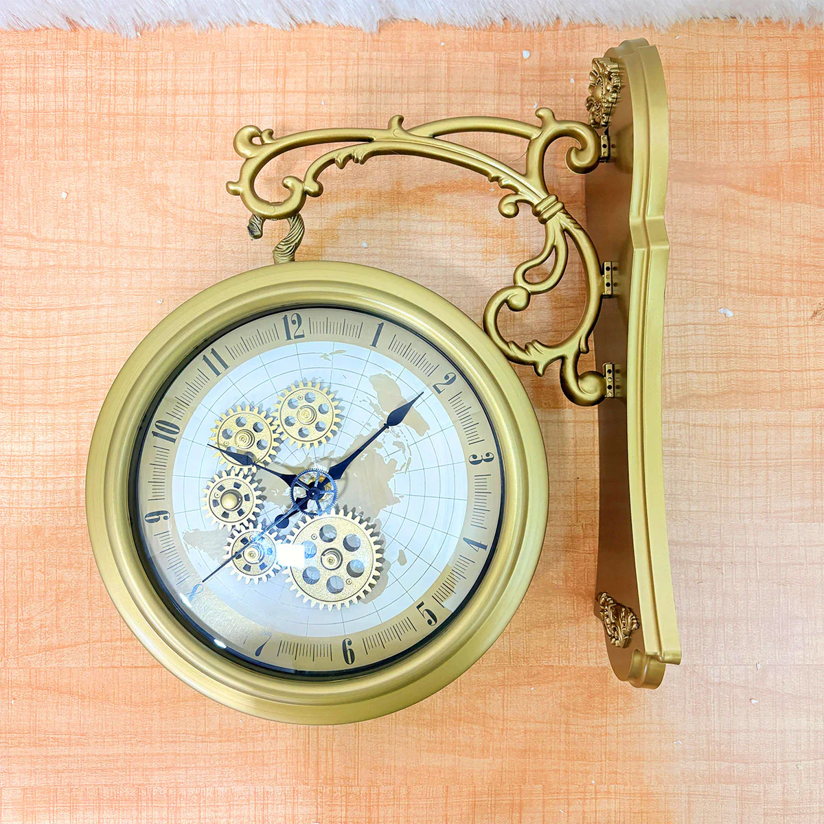 TM0017 Plastic Vintage Double-Sided Wall Clock with Exposed Gears and Ornate Gold Bracket - Image 3